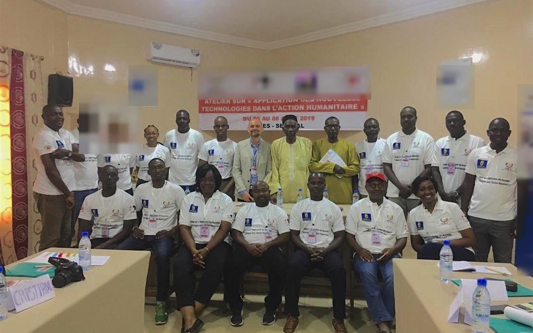 Les participants de l'atelier de Thiès en août 2019, devant la banderole de l'atelier